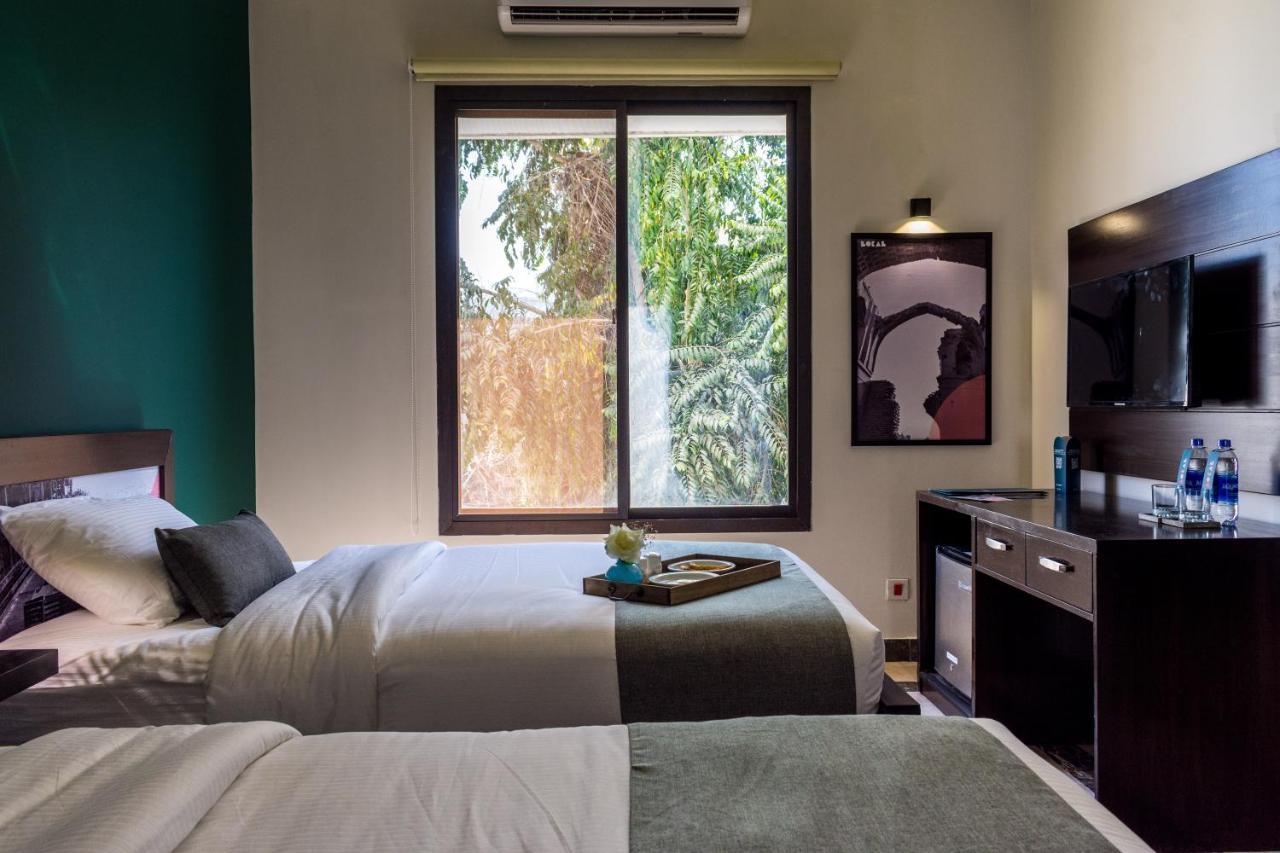 Lokal Rooms X Shahrah-E-Faisal كراتشي المظهر الخارجي الصورة